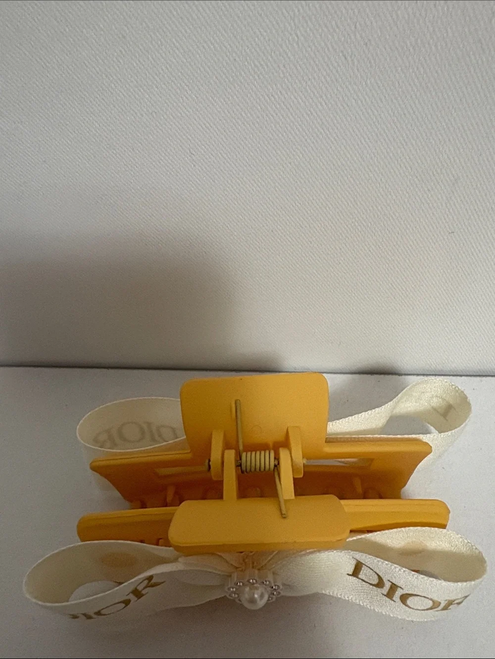 Dior Luxurious white and Gold Ribboned Hair Clip